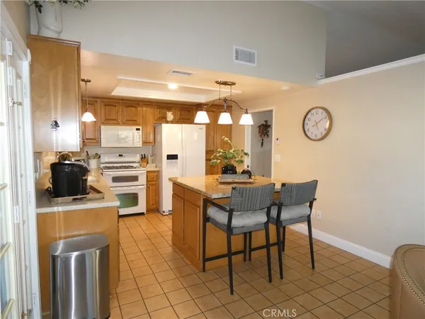 a view of kitchen with breakfast area