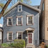 a front view of a house with balcony