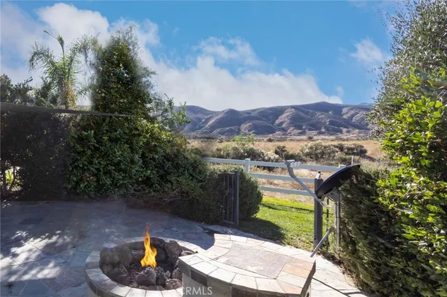 a view of a roadside with trees