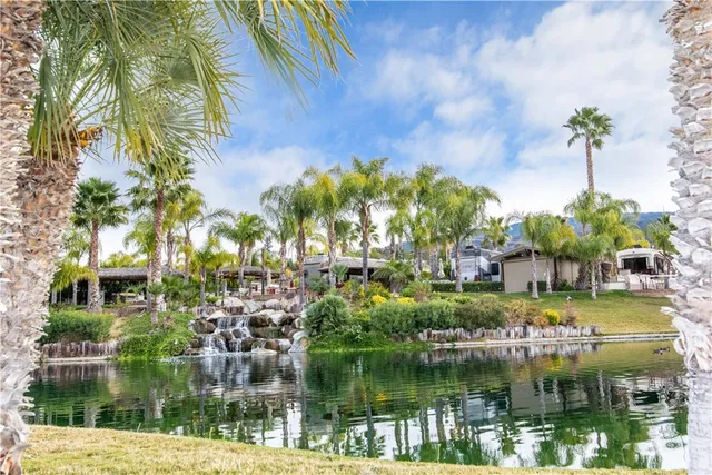 a view of swimming pool with outdoor seating