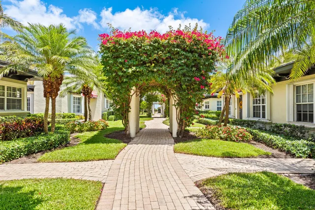 a front view of a house with yard