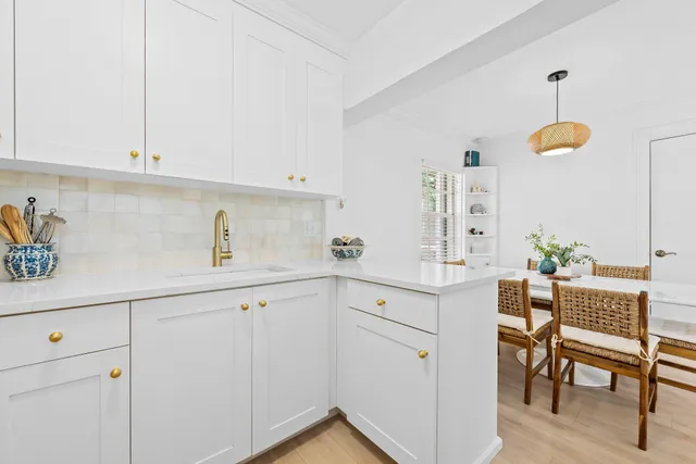 a view of cabinets and window