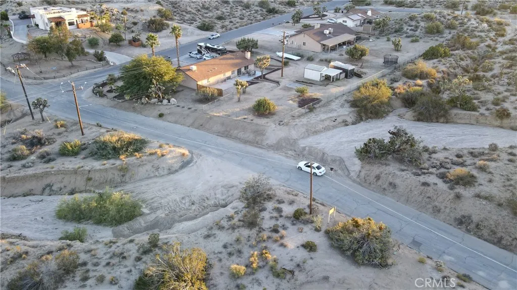 0 Buena Suerte Road Yucca Valley, CA 92284 - Photo 3 of 15 a view of a dry yard with trees