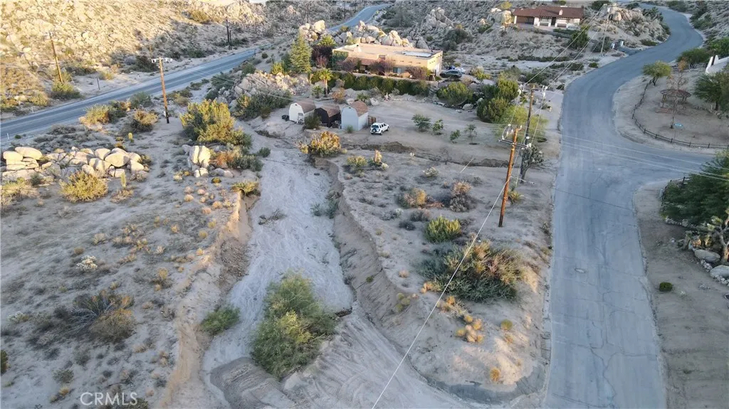 0 Buena Suerte Road Yucca Valley, CA 92284 - Photo 7 of 15 a view of a plants with wooden fence