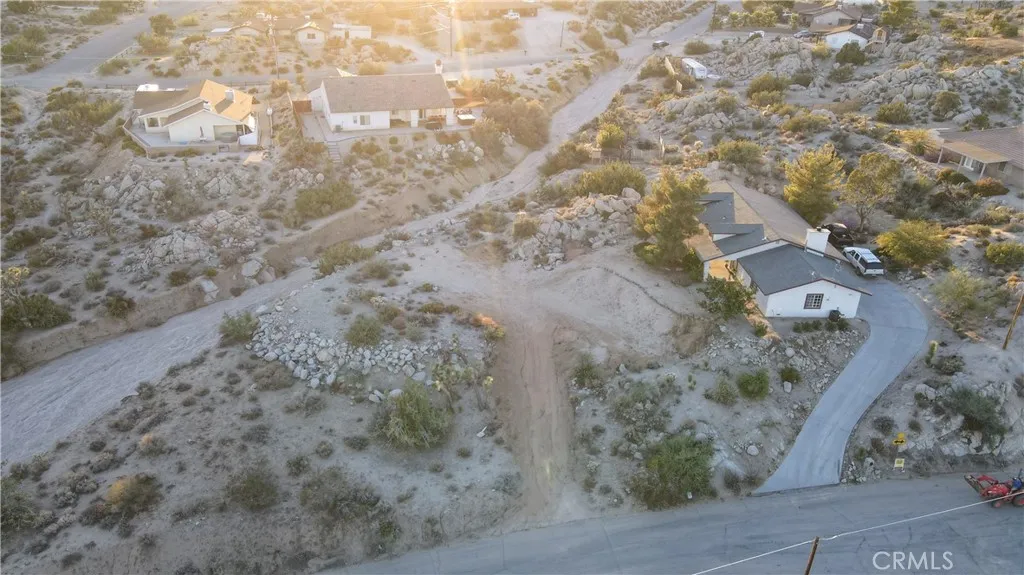 0 Buena Suerte Road Yucca Valley, CA 92284 - Photo 10 of 15 a view of a yard with a mountain