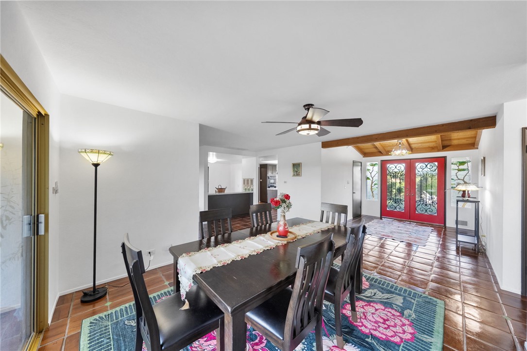 1650 Winterwarm Drive Fallbrook, CA 92028 - Photo 14 of 72 a view of a dining room with furniture window and outside view