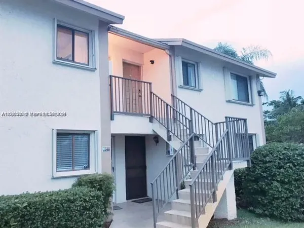 a view of front door and deck