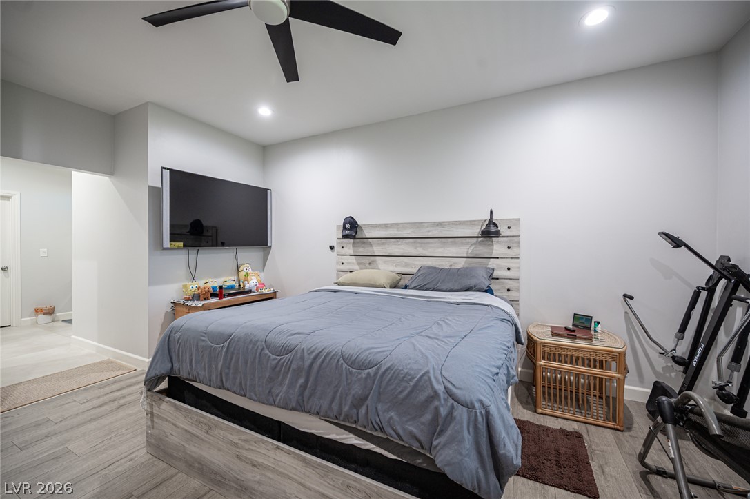 441 Belville Road Pahrump, NV 89048 - Photo 28 of 44 Recessed lighting and a ceiling fan illuminate this comfortable bedroom space.