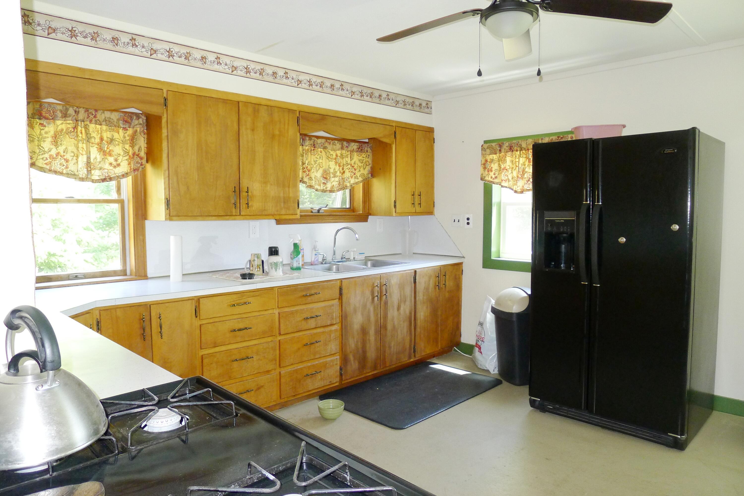 106 East Dixfield Road Dixfield, ME 04224 - Photo 6 of 45 Stove & Refrigerator stay