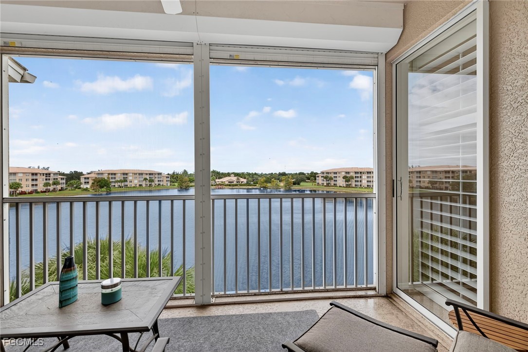 14081 Brant Point Circle, Unit 5403 Fort Myers, FL 33919 - Photo 22 of 41 a view of a balcony with furniture
