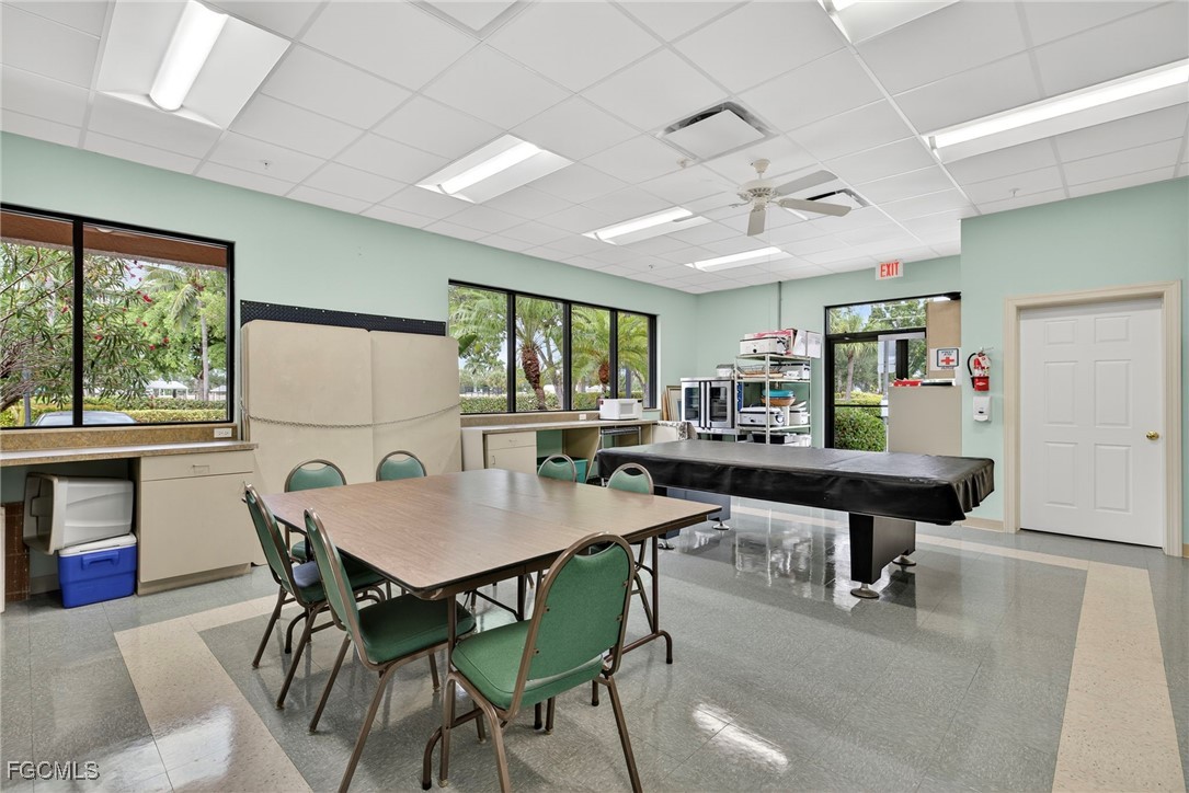 14081 Brant Point Circle, Unit 5403 Fort Myers, FL 33919 - Photo 27 of 41 a view of a dining room with furniture window and outside view