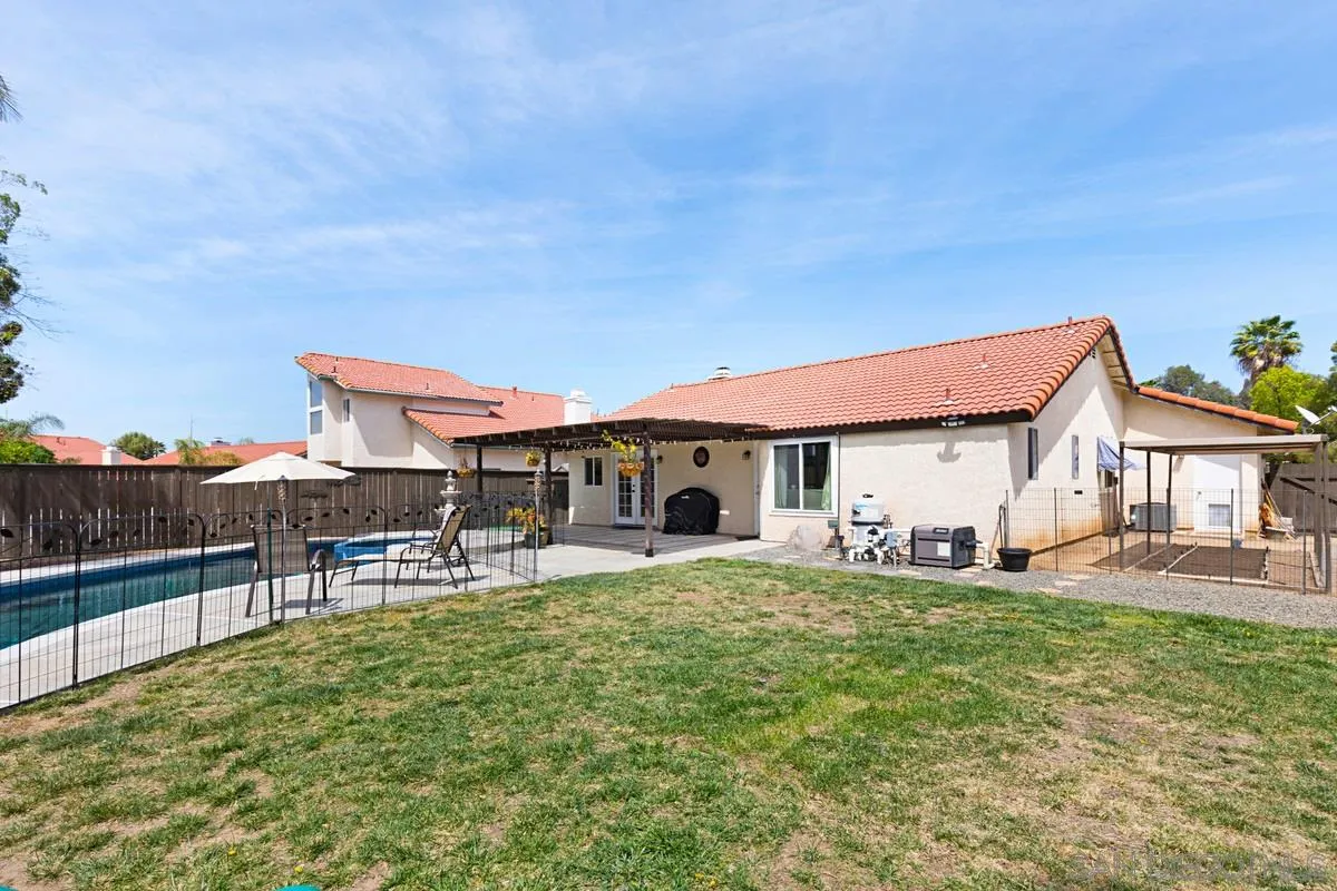 22895 Temet Street Wildomar, CA 92595 - Photo 31 of 36 a house view with a sitting space and garden