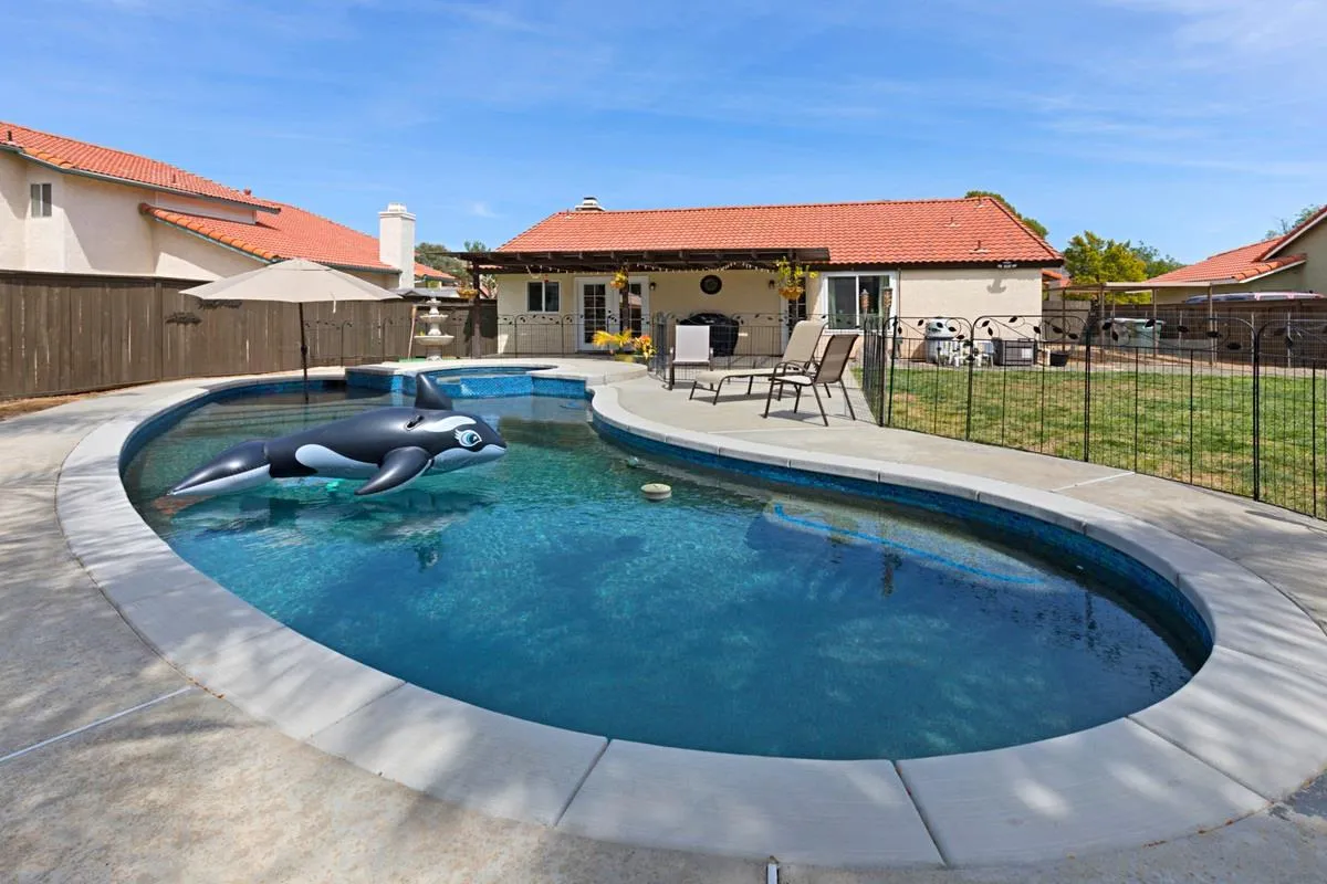 22895 Temet Street Wildomar, CA 92595 - Photo 34 of 36 a view of a house with swimming pool and sitting area