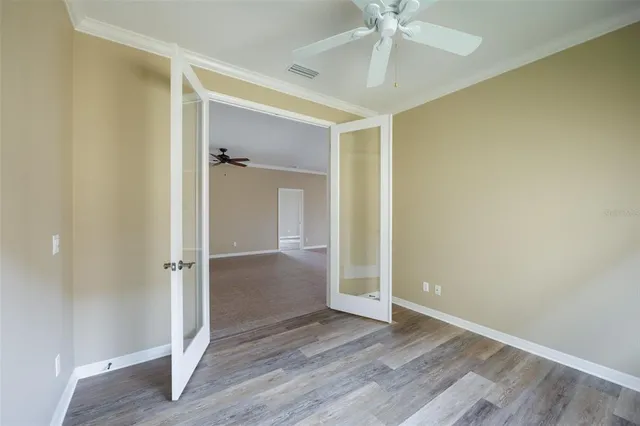 an aerial view of residential house with outdoor space and parking