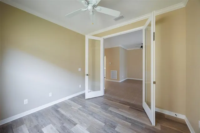 a view of a swimming pool with a patio