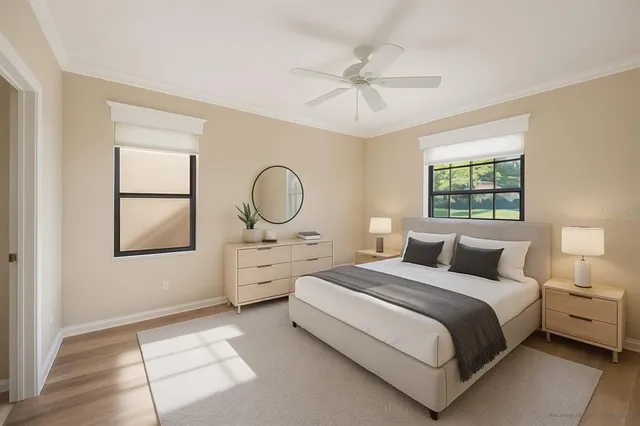 an aerial view of a pool patio lake and mountain view