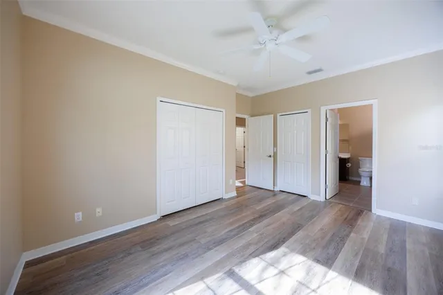 a swimming pool with outdoor seating and yard