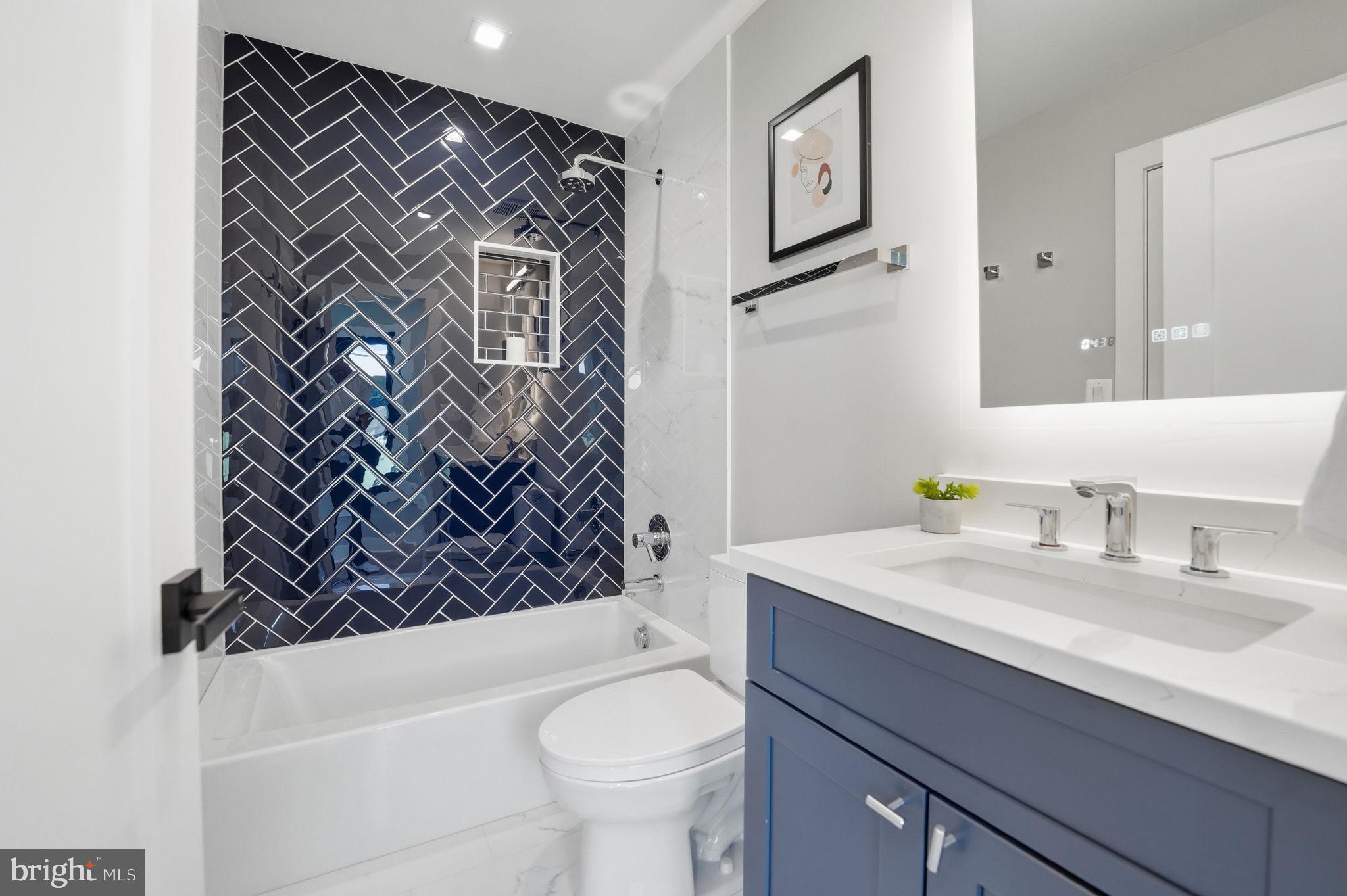 2211 Military Road Arlington, VA 22207 - Photo 62 of 107 Sleek bathroom with modern accents.