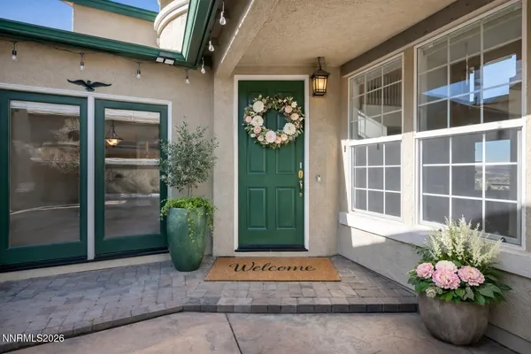 a view of a house with a outdoor space and window