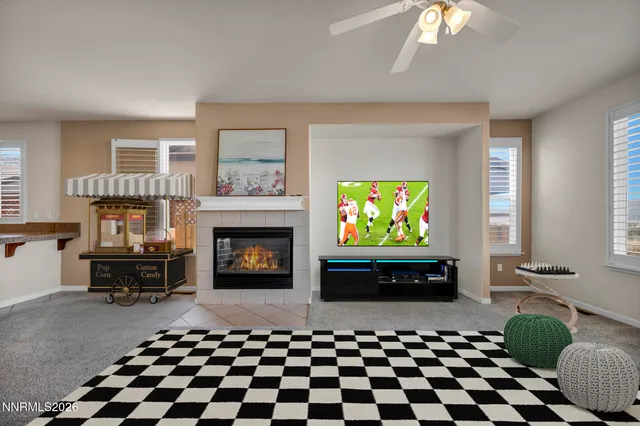 a kitchen with stainless steel appliances granite countertop a sink and a refrigerator
