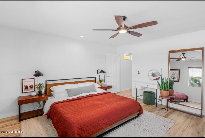 2929 North 39th Street, Unit 2 Phoenix, AZ 85018 - Photo 15 of 26 a bedroom with a bed and window