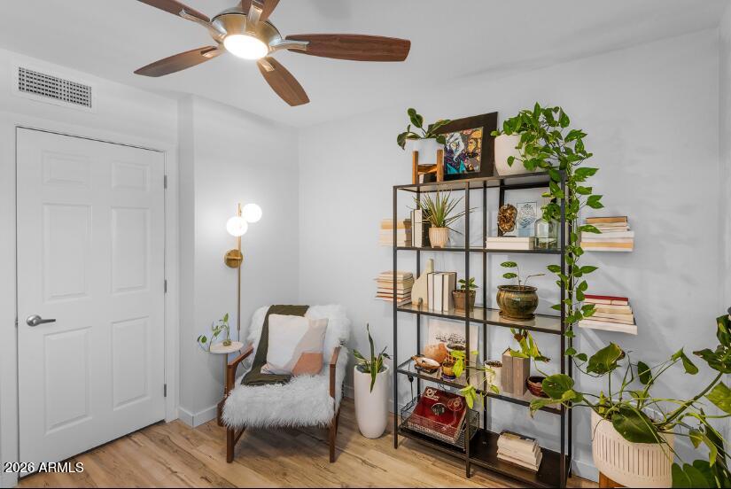 2929 North 39th Street, Unit 2 Phoenix, AZ 85018 - Photo 25 of 26 a hallway with a lots of white furniture and a potted plant