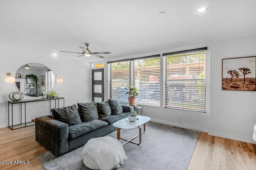 2929 North 39th Street, Unit 2 Phoenix, AZ 85018 - Photo 3 of 26 a living room with furniture and a large window