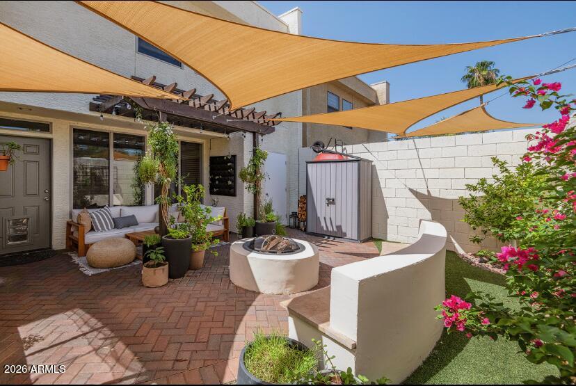 2929 North 39th Street, Unit 2 Phoenix, AZ 85018 - Photo 5 of 26 a view of a patio with couches and a potted plant