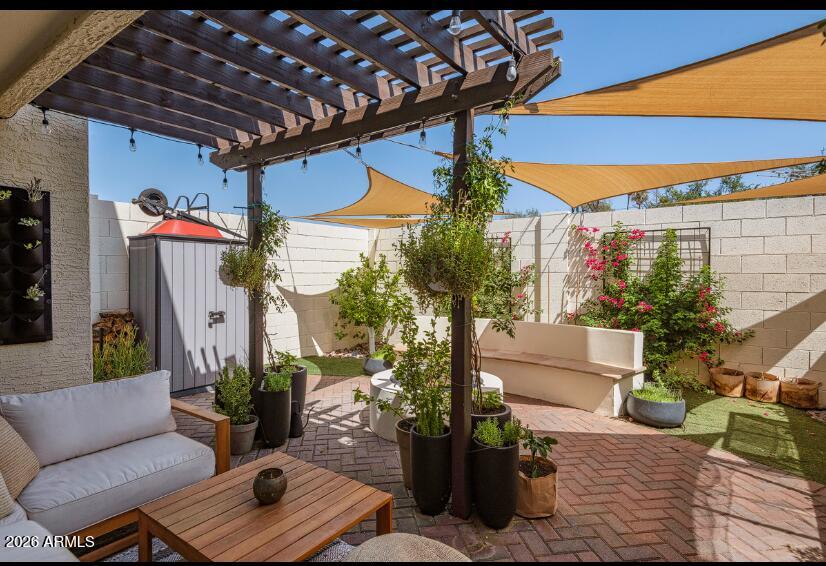 2929 North 39th Street, Unit 2 Phoenix, AZ 85018 - Photo 7 of 26 a view of a patio with couches and potted plants