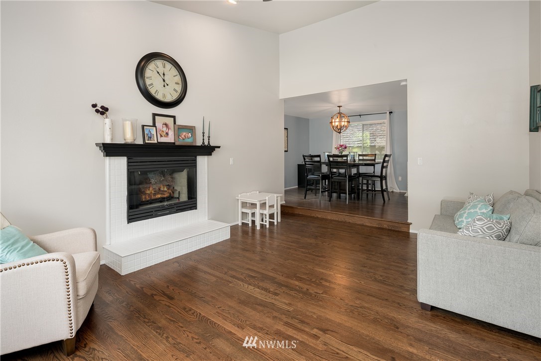 8 170th Place Southwest Bothell, WA 98012 - Photo 3 of 21 a living room with furniture and a fireplace