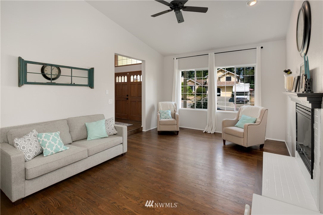 8 170th Place Southwest Bothell, WA 98012 - Photo 5 of 21 a living room with furniture and a couch