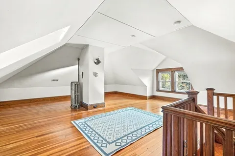 a room with lots of counter and wooden floor