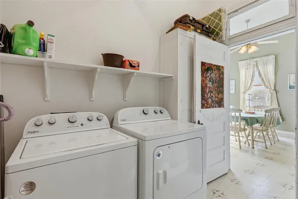 a bathroom with a sink a toilet and vanity