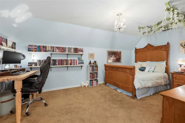 a bathroom with a shower sink and mirror
