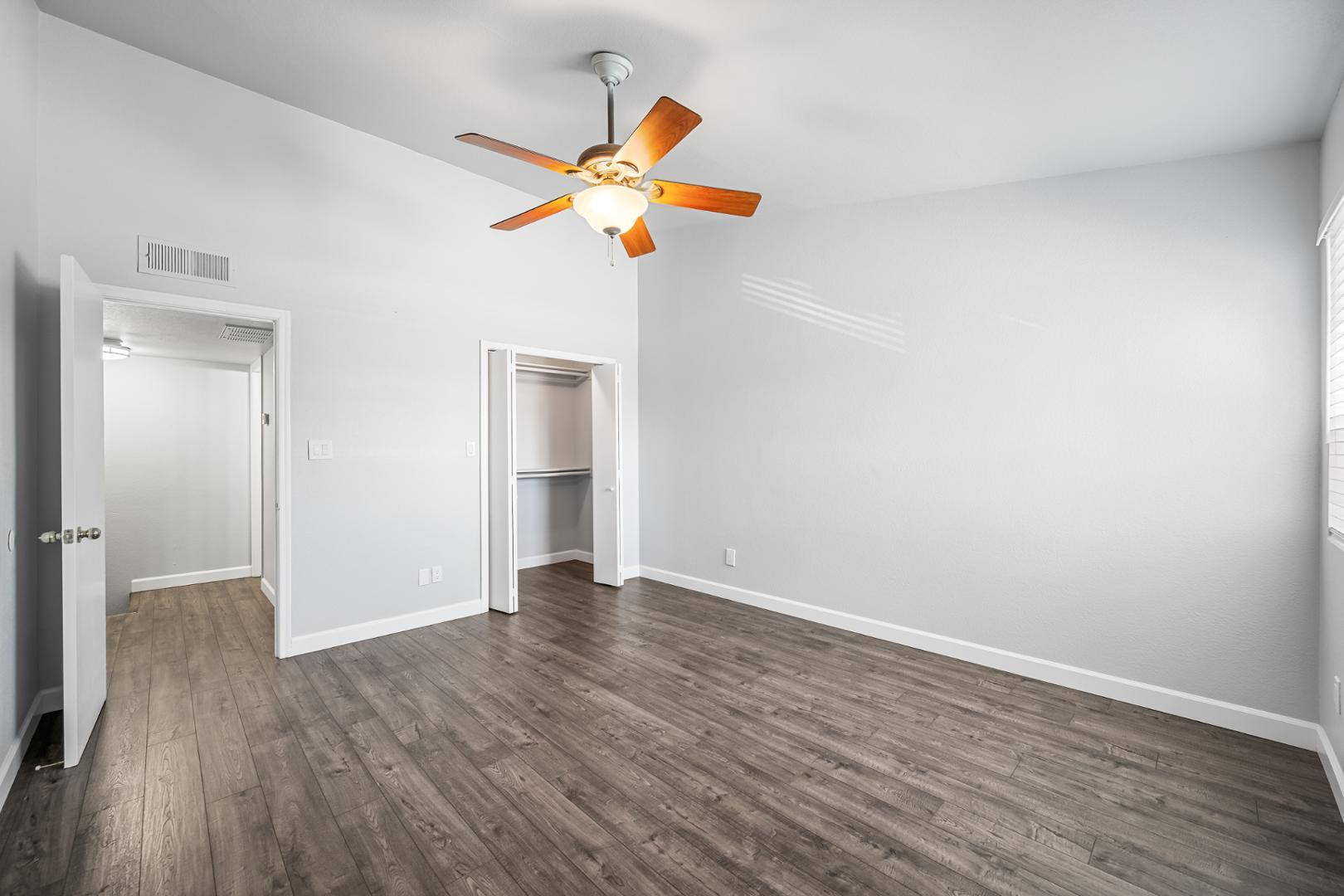 1455 North Alma School Road, Unit 11 Mesa, AZ 85201 - Photo 8 of 17 a view of empty room with wooden floor