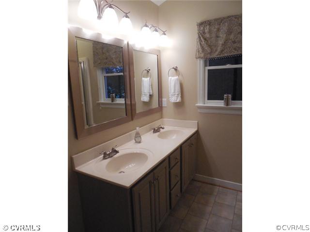 13904 Sagebrook Road Midlothian, VA 23112 - Photo 12 of 19 a bathroom with a sink and a mirror