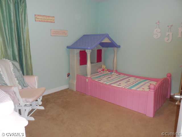 13904 Sagebrook Road Midlothian, VA 23112 - Photo 15 of 19 a bedroom with a bed and a chair