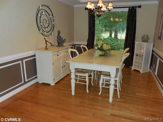 13904 Sagebrook Road Midlothian, VA 23112 - Photo 7 of 19 a view of a dining room with furniture window and wooden floor