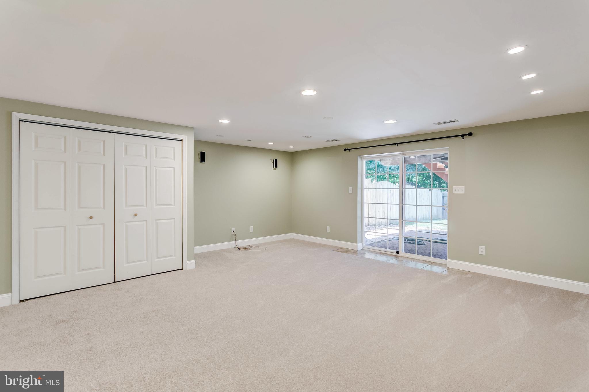 38 Powderock Place Baltimore, MD 21236 - Photo 27 of 42 Family Room with storage closets
