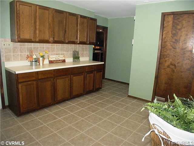 3101 Nahant Road Midlothian, VA 23112 - Photo 6 of 11 Other - 16'x11' Laundry room with lots of cabinets