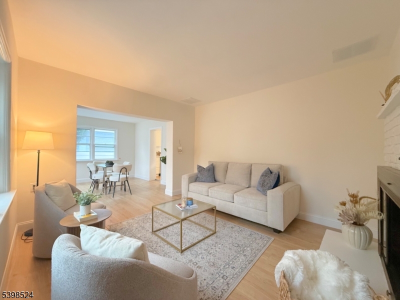 484 Bara Street Brick, NJ 08723 - Photo 4 of 15 a living room with furniture and wooden floor