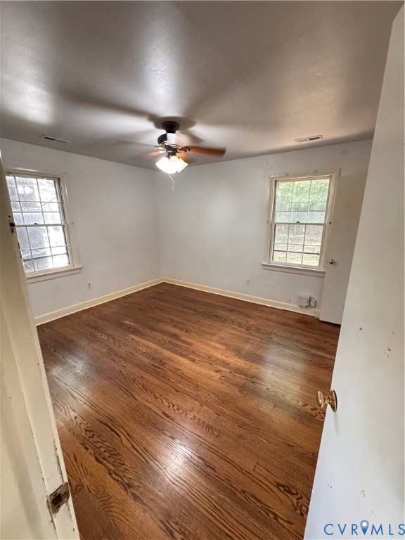 7019 Fairpines Road Richmond, VA 23234 - Photo 6 of 18 Room featuring wood-finish flooring, white walls,
