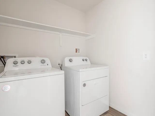 a utility room with dryer and washer