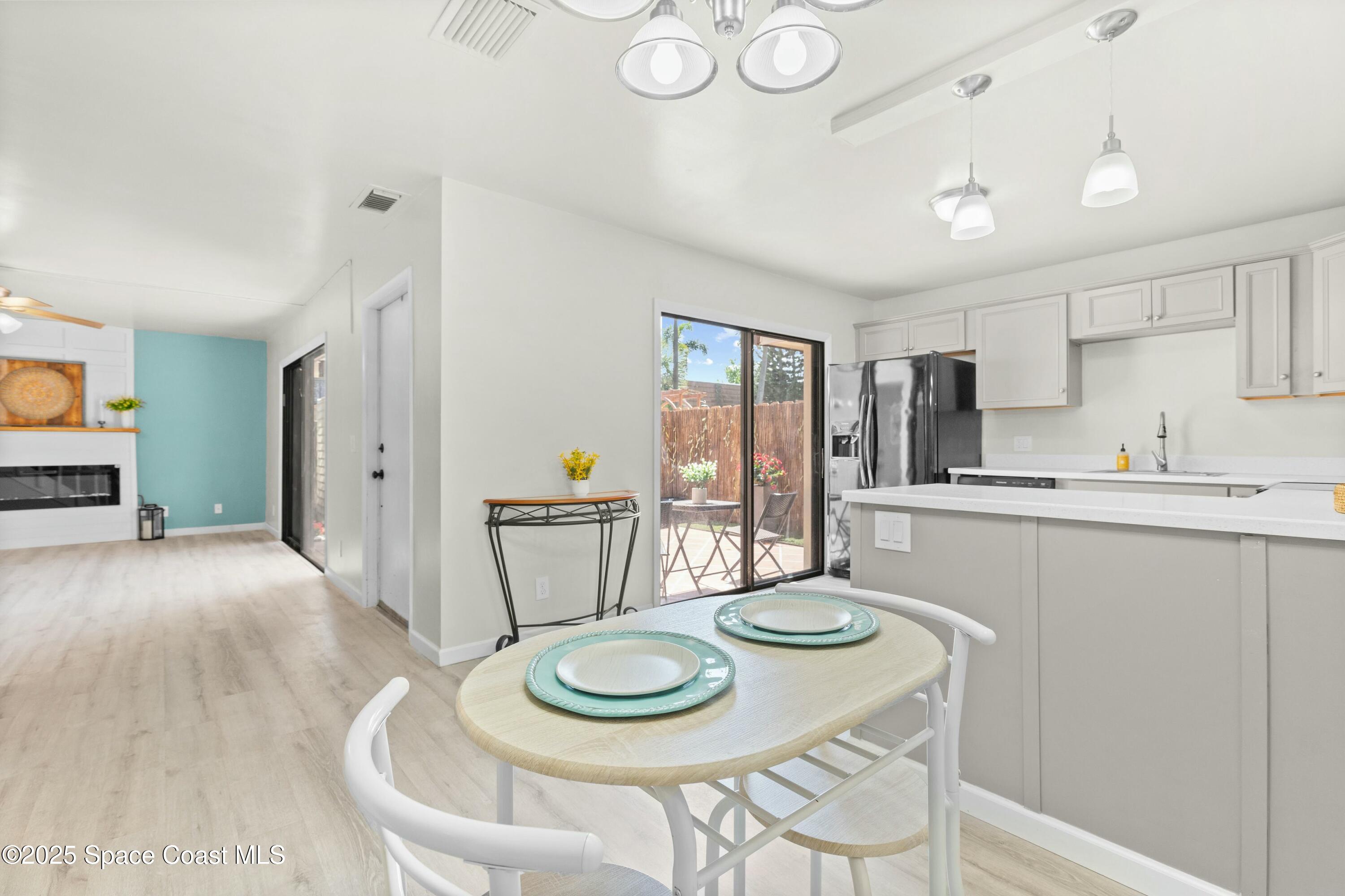 3311 Kaileen Circle Northeast Palm Bay, FL 32905 - Photo 7 of 26 Dining to Kitchen