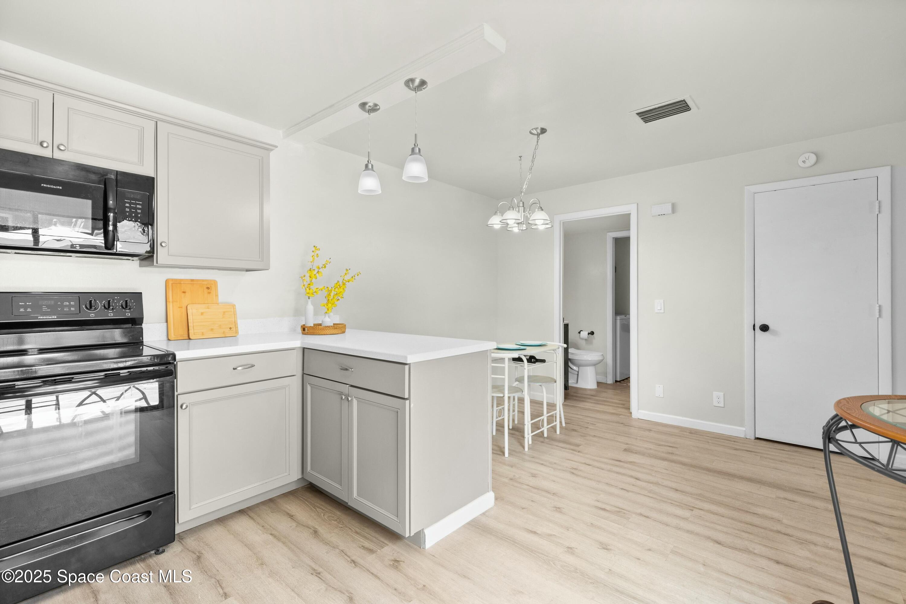 3311 Kaileen Circle Northeast Palm Bay, FL 32905 - Photo 10 of 26 Kitchen to Dining
