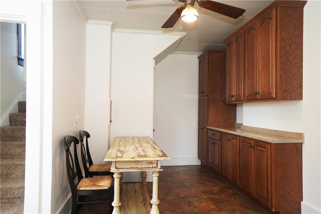 124 Hazel Street Kittanning, PA 16201 - Photo 14 of 26 a view of kitchen island with cabinets and wooden floor