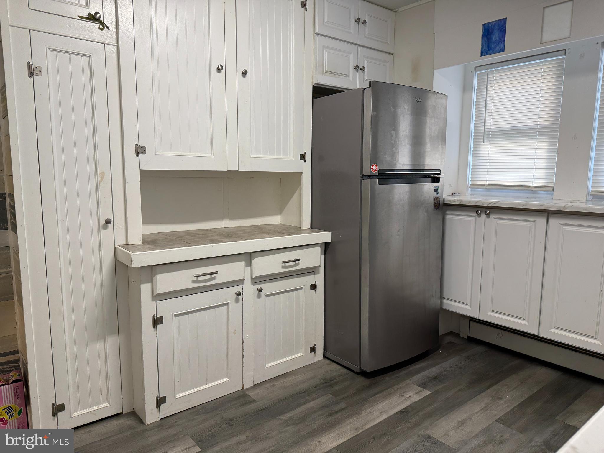930 Tappan Street Forked River, NJ 08731 - Photo 8 of 13 a kitchen with appliances and cabinets