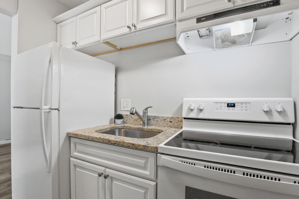 157 Franklin Street, Unit A10 Stoneham, MA 02180 - Photo 6 of 10 a close view of sink and tap