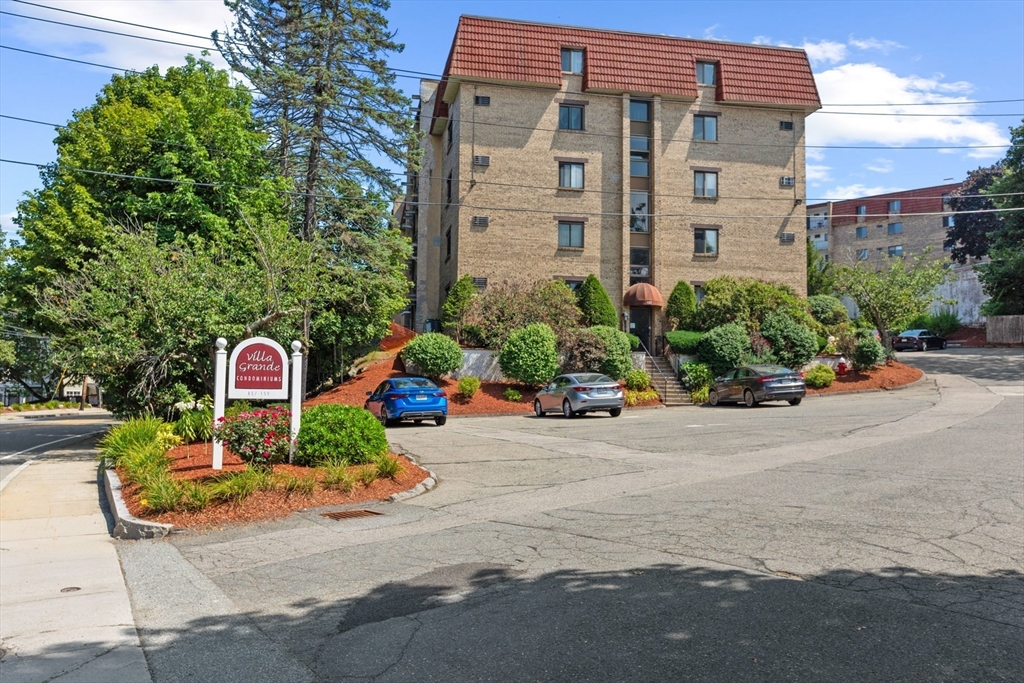 157 Franklin Street, Unit A10 Stoneham, MA 02180 - Photo 9 of 10 a front view of a building