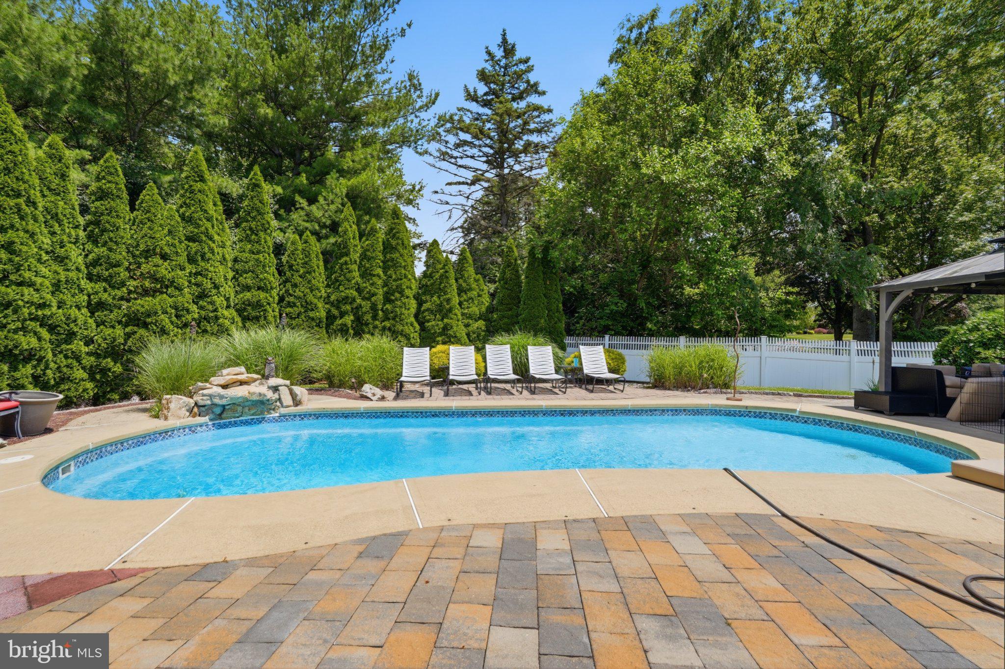 1002 Tannerie Run Road Ambler, PA 19002 - Photo 8 of 67 Serene poolside retreat awaits you.